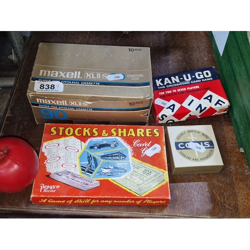 838 - A mixed lot of items. Includes Maxell XLII-S cassette tapes (5 sealed tapes), Stocks & Shares card g... 