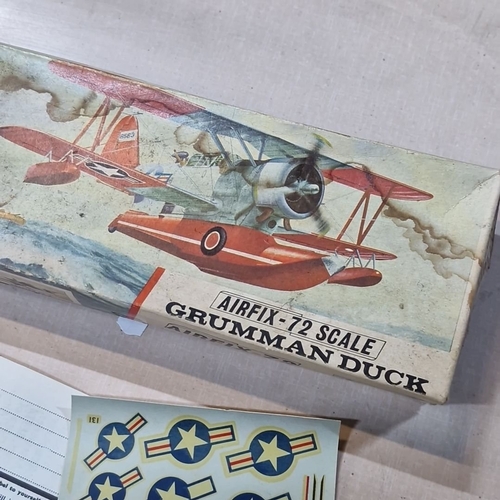 845 - Twi items. Includes a Vintage Red Leather Bicycle Saddlebag and a 1/72 Airfix Grumman Duck J2F6 Mode... 