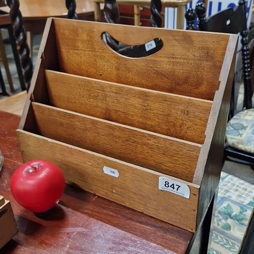 847 - A wooden letter rack, from the mid-20th century. Features three compartments and a carry handle.