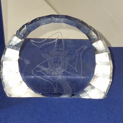 862 - A Swarovski Crystal heavy crystal paperweight etched with the Three Legged symbol of the Isle of man... 