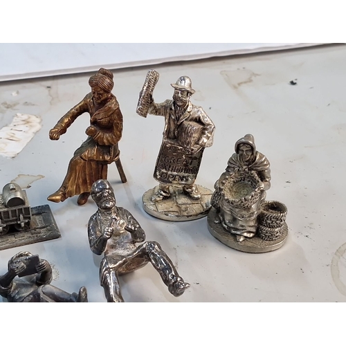 864 - Nine cast pewter miniature figures including examples by Royal Hampshire.