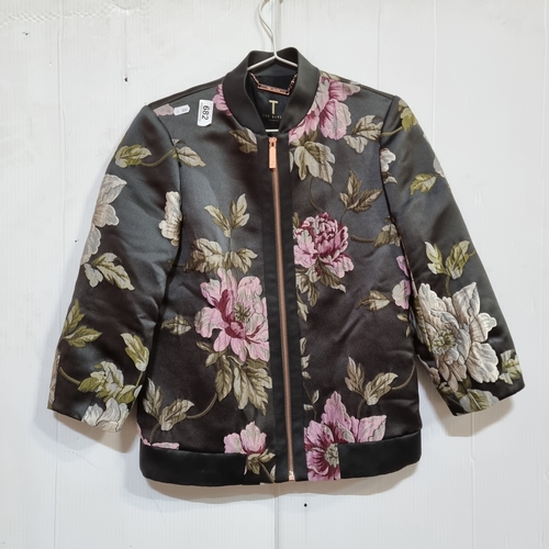 682 - A gorgeous 'Ted Baker London' Floral Jacquard Bomber. Features shades of soft pinks, blues and green... 