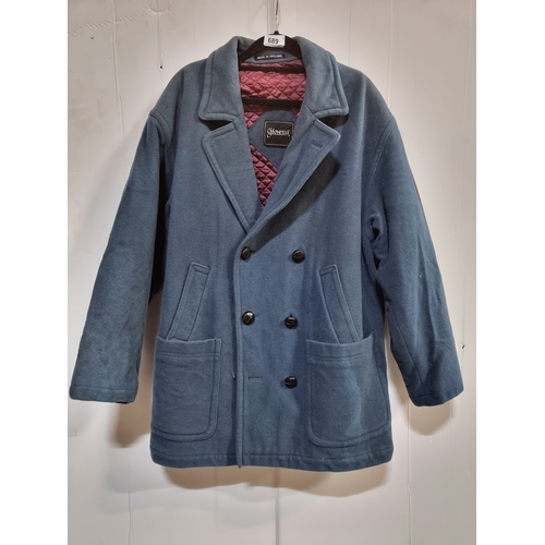 689 - A 'Gloverall, Made in England' 100 % wool coat. Features an indigo tone. Size: M