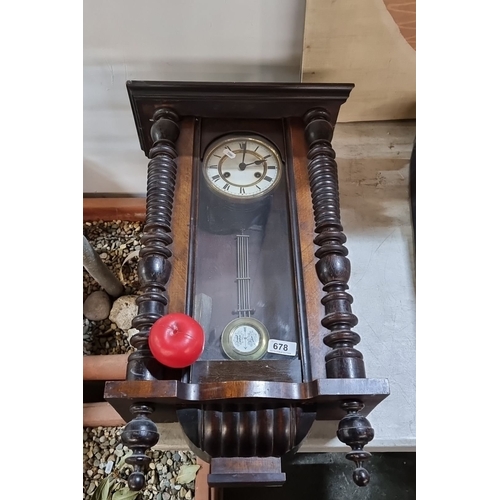 678 - 19th Century German Wall Clock, richly carved wooden case, Roman numeral dial, brass pendulum with 