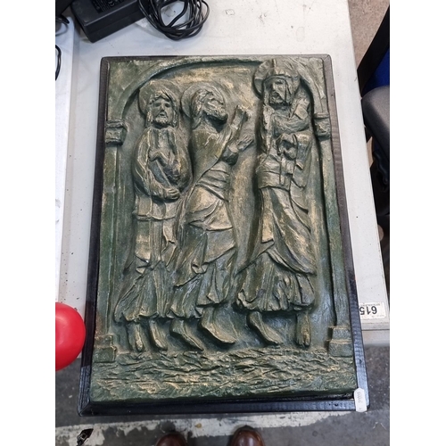 871 - Bas-relief wall plaque depicting three robed figures, cast resin with green-gold patina, mounted on ... 