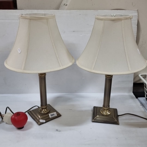 884 - Pair of vintage brass column table lamps with classic pleated fabric shades.