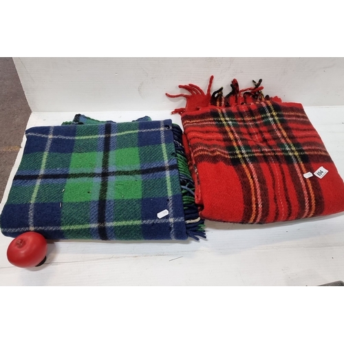 894 - Two wool blankets: one vintage green/blue Foxford Irish wool blanket and one red tartan plaid blanke... 