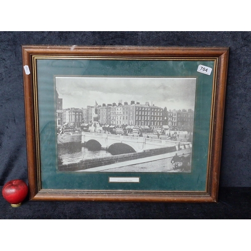 704 - A print of an original photograph of O'Connell Bridge, Dublin taken in the 20th century. Housed in a... 