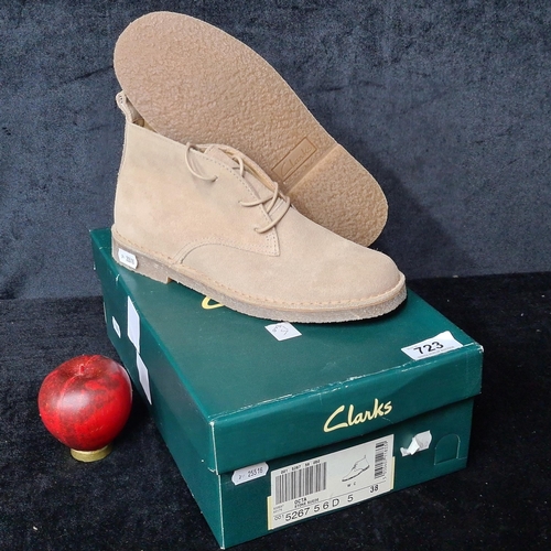 723 - An as new pair of Clarks suede boots, size UK 5. Complete in original box. RRP: €69.00