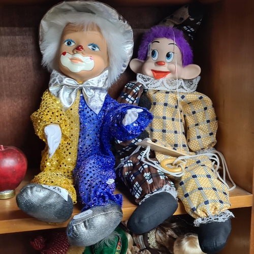 728 - Two vintage porcelain face clowns including a marionette string puppet example and jazzy sequined ex... 