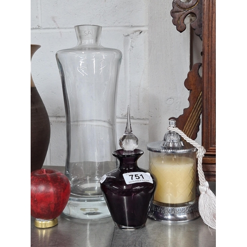 751 - An LSA glass decanter together with a purple glass perfume bottle with transparent stopper and a can... 