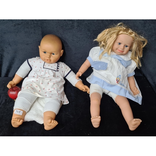 757 - Two large childrens dolls including a Peterkin 'Sailor' example.