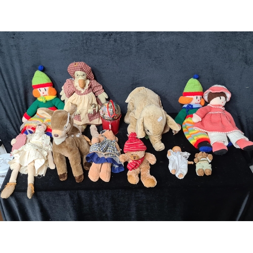 758 - A sweet collection of childrens toys including some hand knitted examples.