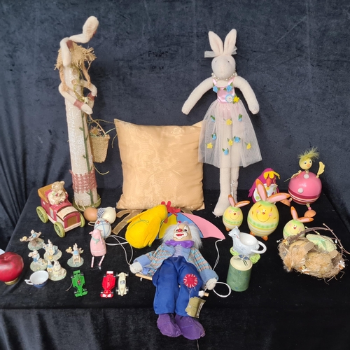 779 - A mixed lot of adorable Easter themed items including two tall rabbit figures.