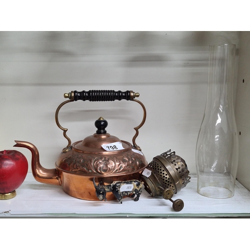 798 - A mixed lot including a copper tea kettle along with a glass oil lamp.