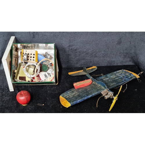 815 - Star lot :A wonderful vintage 1950s hand crafted plane with engine with a  tin containing additional... 