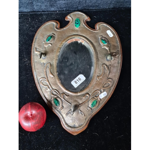 816 - Star Lot: A magnificent example of a genuine Art Nouveau bevelled mirror featuring emerald enamel de... 