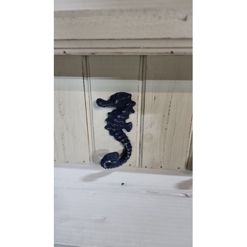 980 - A brand new  Wooden wall shelf with five decorative cast iron seahorse hooks. Really like these.
Pre... 