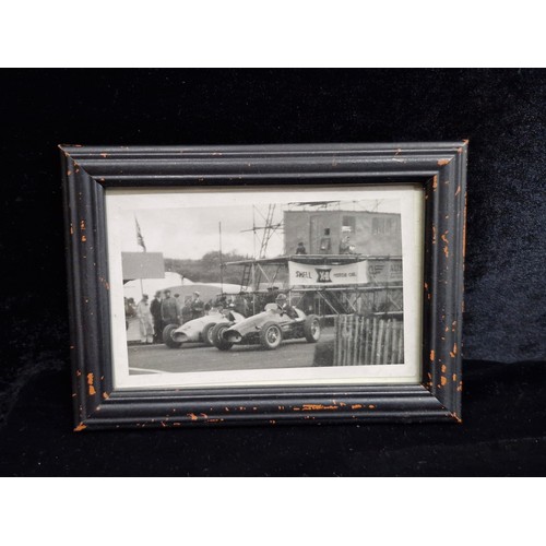 107 - Eleven vintage motorsport photographs featuring classic racing cars from the 1950's such as Maserati... 