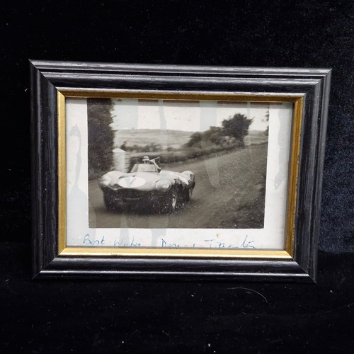 107 - Eleven vintage motorsport photographs featuring classic racing cars from the 1950's such as Maserati... 