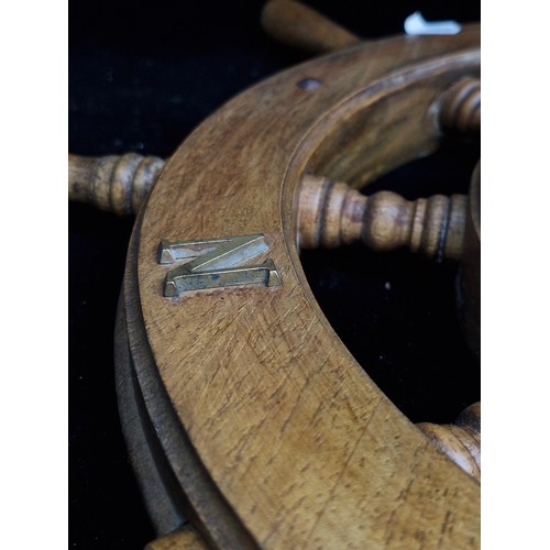 143 - Star Lot : An excellent vintage wooden ships helm with brass porthole compass to centre. Great looki... 