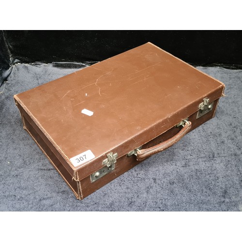 307 - A vintage brown leather brief case with initials 'E. F.'