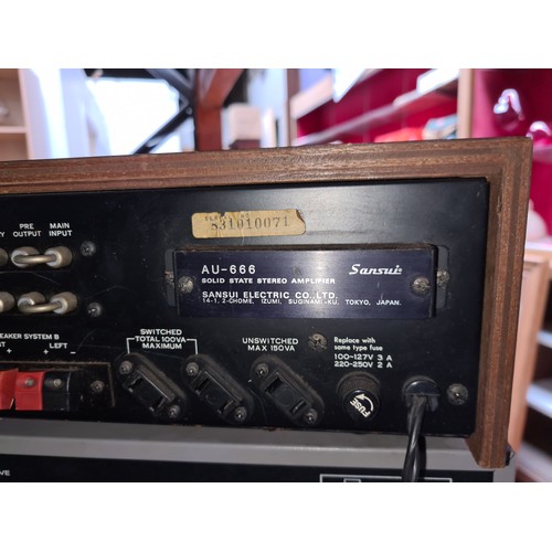 375 - Star Lot : A Sansui solid state stereo amplifier AU-666 (RRP 325.83 via audio-database.com), a Tensa... 