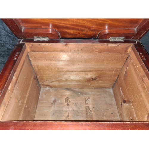 379 - An Antique wooden storage chest with bun feet. Missing handles. We will look to replace handles prio... 