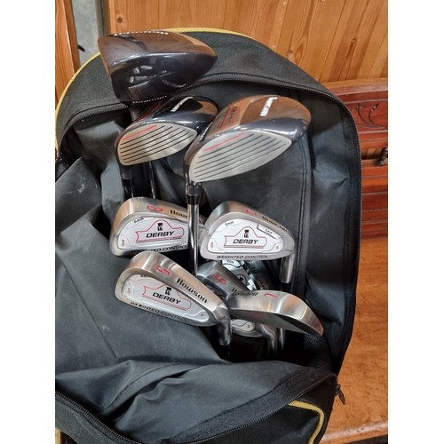 458 - An as new set of Howson golf clubs with driver, 3 wood and 5 wood, 4 to 7 clubs and sand wedge, with... 