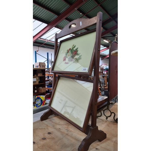 428 - A vintage folding two tier serving table.