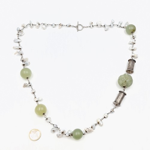 823 - Star Lot: A fabulous antique Chinese natural pearl and jade necklace with jade carved ball with a Ch... 