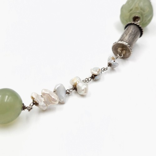 823 - Star Lot: A fabulous antique Chinese natural pearl and jade necklace with jade carved ball with a Ch... 