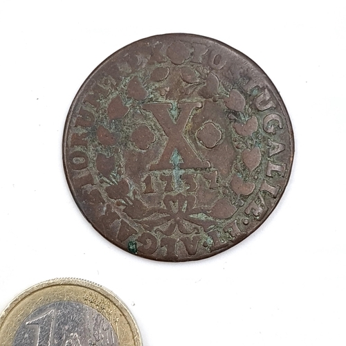 579 - A rare 1737 ten Anne cross coin.