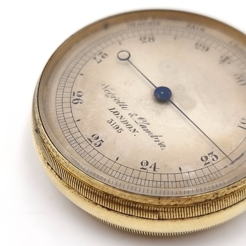 26 - Star Lot : A rare antique brass pocket barometer by the renowned makers 'Negretti & Zambra'. London ... 