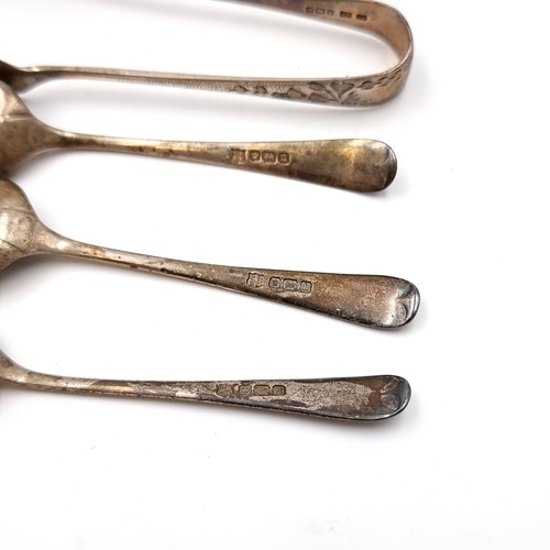 28 - A boxed collection of four silver teaspoons hallmarked Sheffield. Together with a pair of sugar tong... 