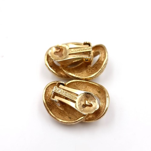 57 - A pair of designer Christian Dior clasp earrings. Weight - 22 grams. Fully marked to clasp, great we... 