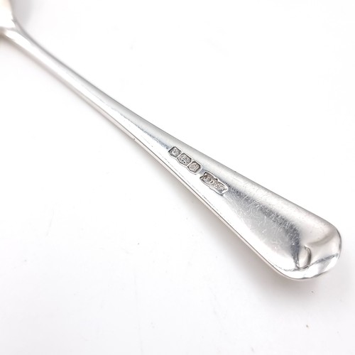 520 - A set of six bright cut teaspoons hallmarked Sheffield together with sugar tongs. Total weight - 110... 