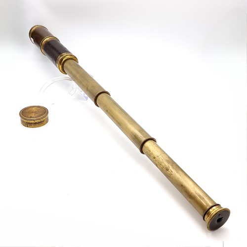 524 - A nice example of antique leather and brass three drawer telescope with fitted lens cover. Weight - ... 