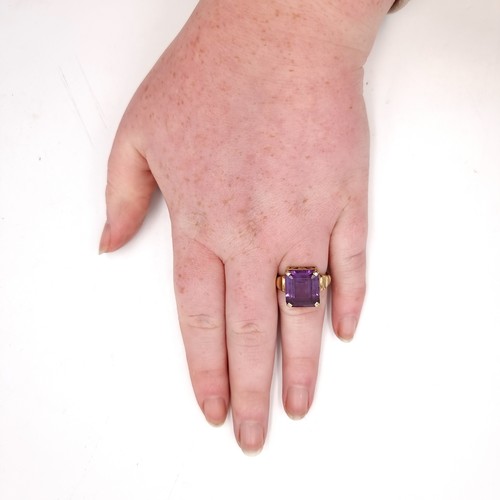 557 - Star Lot : A nice example of a quality antique nine carat gold (375) amethyst stone ring set with cl... 