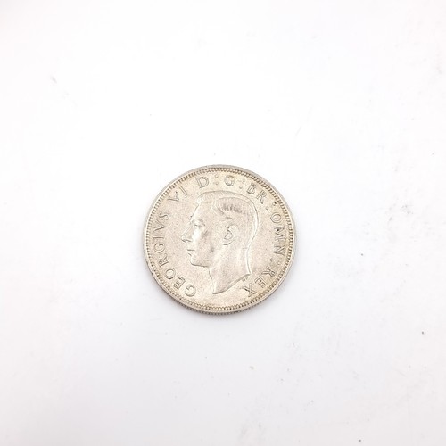 577 - A 1939 uncirculated UK half crown. Weight - 14.04 grams.