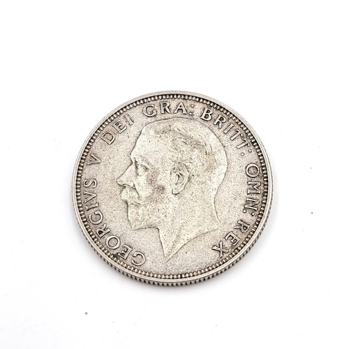 583 - A rare UK Florin dated 1933.