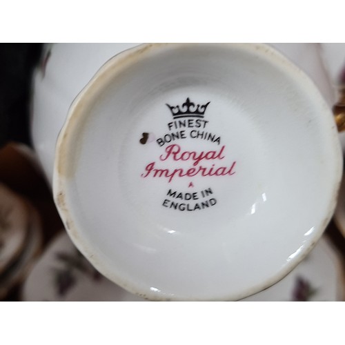 739 - A 21 piece Royal Imperial China set including cups, saucers, side plates, milk jug and sugar bowl. A... 