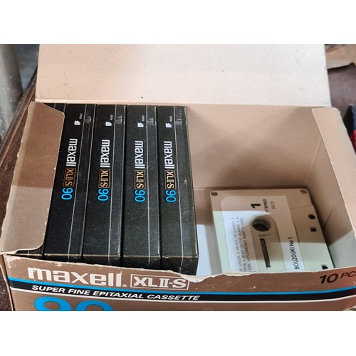 838 - A mixed lot of items. Includes Maxell XLII-S cassette tapes (5 sealed tapes), Stocks & Shares card g... 