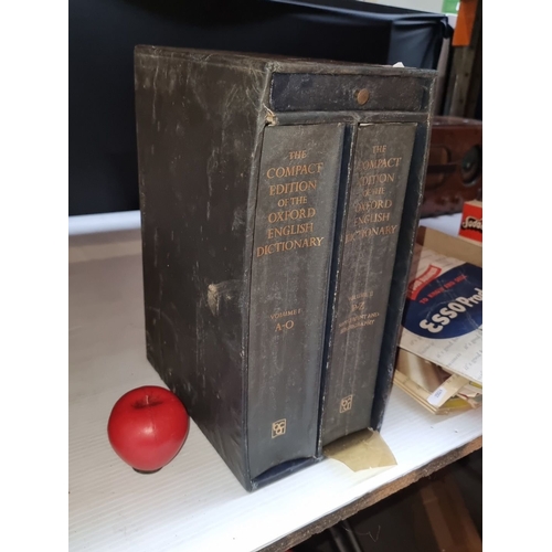 403 - Two large hardback book volumes of The Compact Edition of the Oxford English Dictionary (A-O, P-Z) i... 