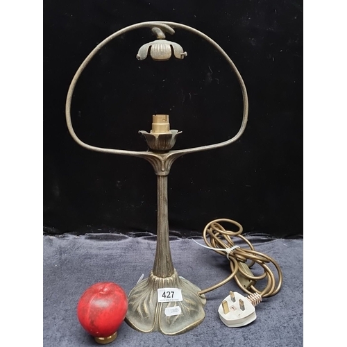 427 - Art Nouveau style metal table lamp with floral motif and bronze finish. Distinctive design, decorati... 