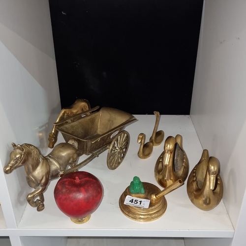 451 - Brass collection includes a horse-drawn cart, swan figurines, candlestick, and jade Buddha figure.