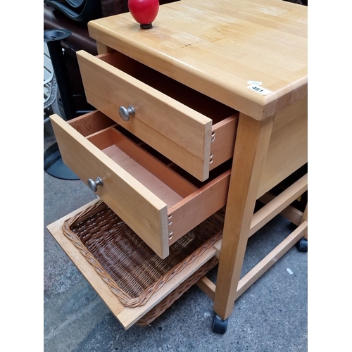 461 - Solid wood kitchen cart with two drawers, wicker basket storage, and rolling casters.