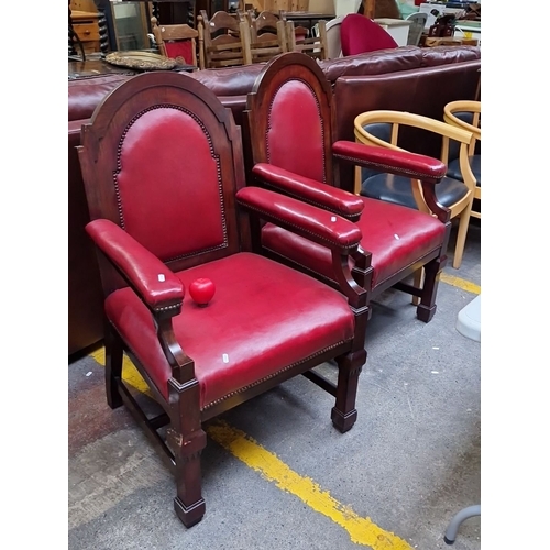 462 - Star Lot : Pair of very impressive vintage mahogany armchairs feature arched backs and red leather u... 