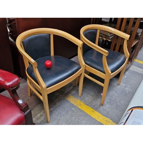 465 - A pair of handsome Derrys Ltd., tub chairs. Similar designs on Derrys Ltd website €181.95 each. In g... 