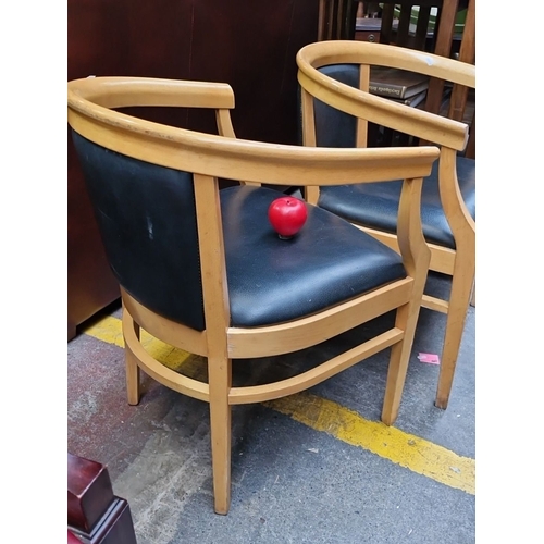 465 - A pair of handsome Derrys Ltd., tub chairs. Similar designs on Derrys Ltd website €181.95 each. In g... 